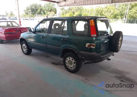 1999 Honda Cr-V Lx z USA, uszkodzony, nr VIN JHLRD2847XC024791